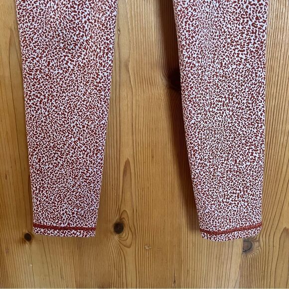 Athleta Rust Cheetah Print Salutation Stash Textured 7/8 Pocket Leggings - Picture 8 of 11
